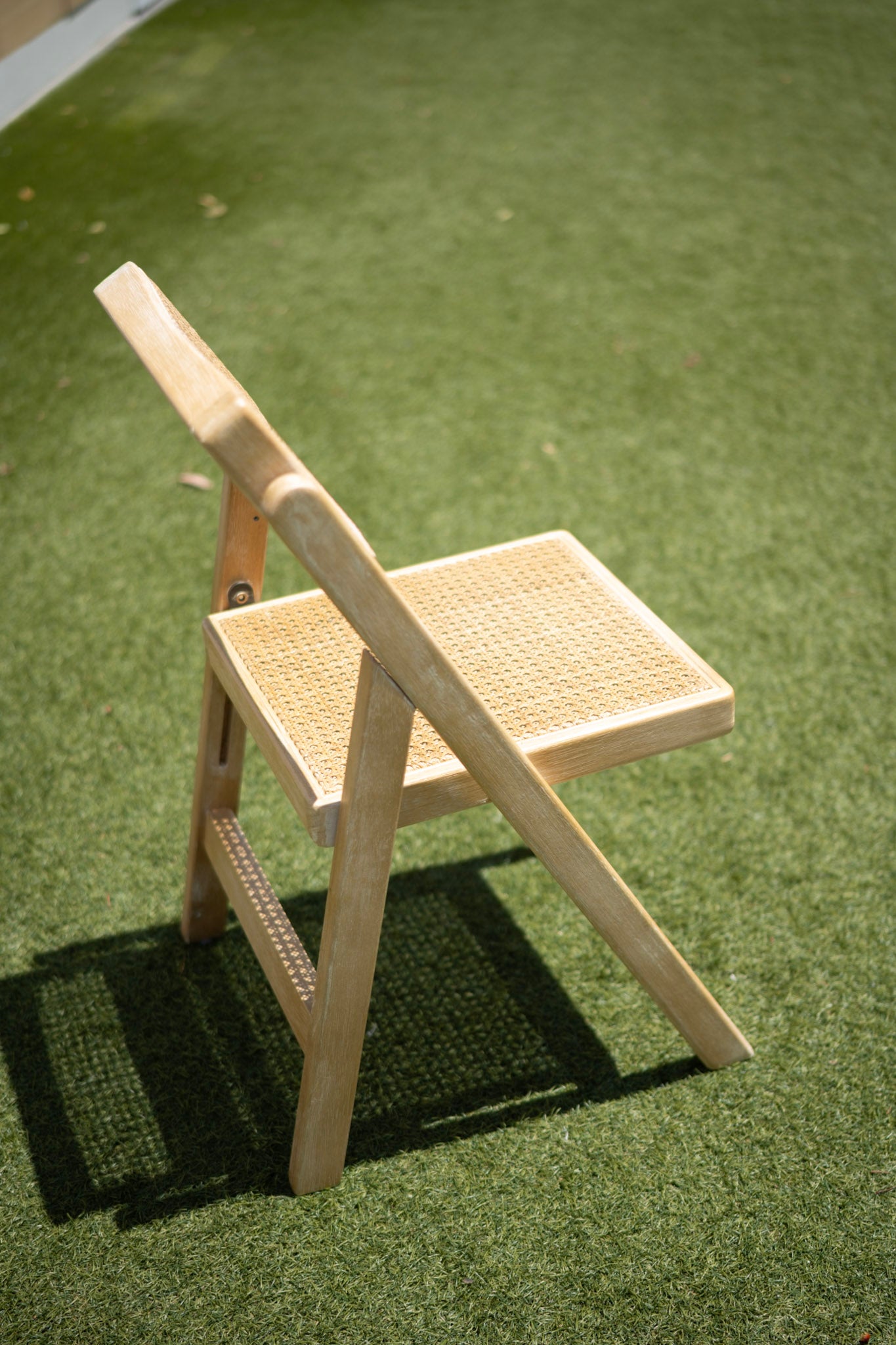 The Newport Rattan Folding Chair Rental – Natural Wood Event Chair | Orange County Huntington Beach Newport Beach
