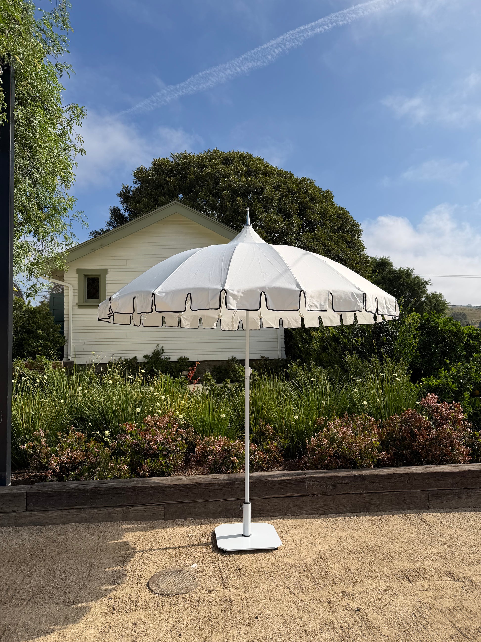 antique white scalloped patio umbrella White Pagoda Style Scalloped Umbrella Rental - Orange County
